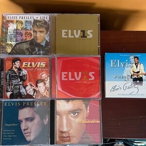 7 Elvis cd lot. 2 are still sealed